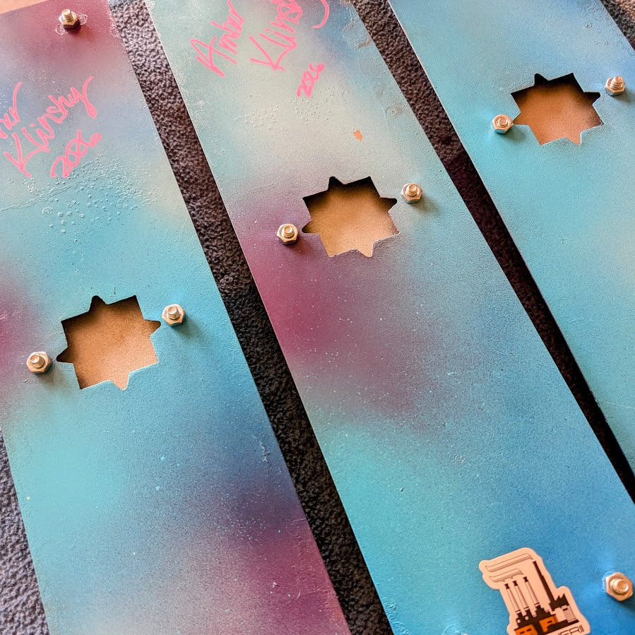 Signed back panels: Back of the Confluence panels, signed by Amber Klinsky, 2026, showing the single mounting cutout on each.
